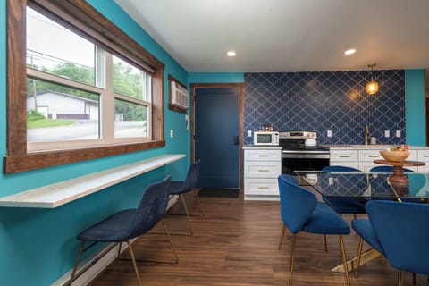 A guest favorite for its size, layout, and downtown location—Sapphire offers room for everyone with 3 private bedrooms, 1.5 baths, cozy living space, and access to game room fun and rooftop views.