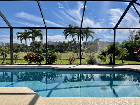 Sought after southern exposure view and Heated pool from the covered lanai!