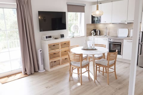 bright living and dining area