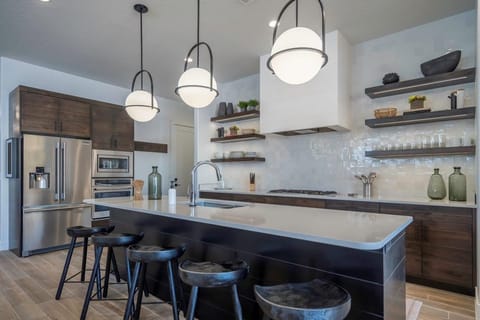 Open concept kitchen with large island that seats 5