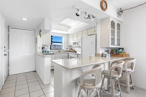 Condo, 2 Queen Beds, Balcony, Pool View | Private kitchen | Fridge, microwave, oven, stovetop