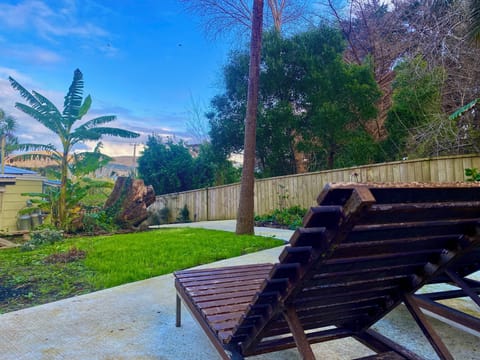 Rear fully fenced tropical garden (views to dunes and sea