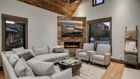Cozy great room wit hTV and fireplace