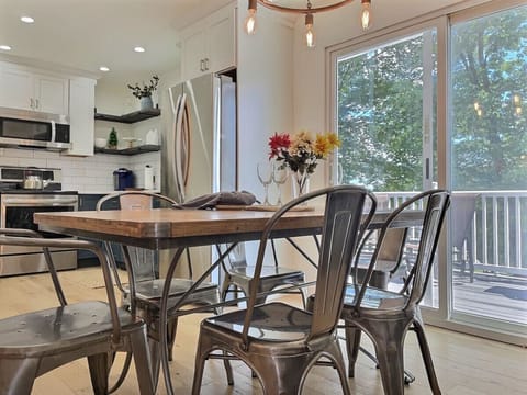 Enjoy elegance at our wooden dining area for unforgettable meals and intimate conversations.