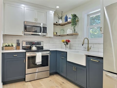 Experience culinary delight in our fully equipped kitchen, ready for all your cooking adventures.