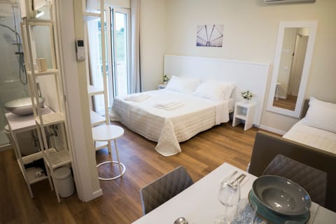 Standard Studio, Tower | Hypo-allergenic bedding, down comforters, free cribs/infant beds