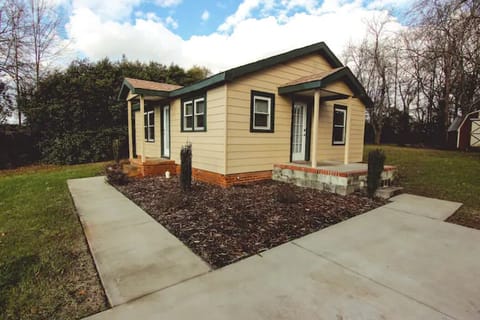 Entrance is side door. We use keyless smart locks. 