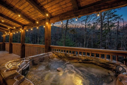 Outdoor Hot Tub – Unwind in the private hot tub, surrounded by nature