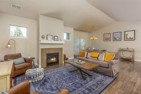 Relax in this newly furnished living space with a cozy fireplace