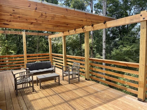 back porch 450sf at the top of 100 years old oak forest .