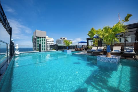Outdoor pool, open 6:30 AM to 9:30 PM, pool umbrellas, sun loungers