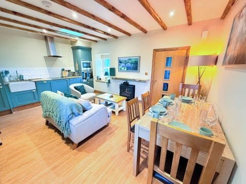 Open plan living space | Bumblebee Cottage - Ballavolley Cottages, Ballaugh