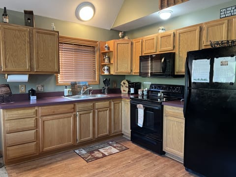 Spacious fully stocked kitchen! 