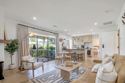 Take in the charming décor in the living-room/kitchen area.