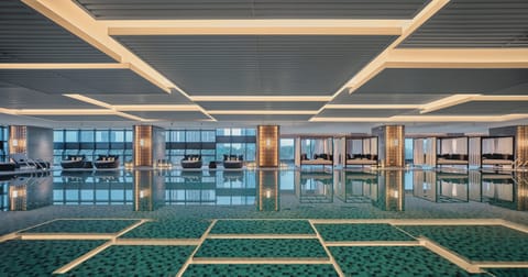 Indoor pool, open 6:00 AM to 11:00 PM, sun loungers