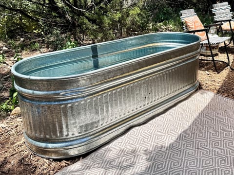 Private stock tank pool (seasonal, open May-Oct)