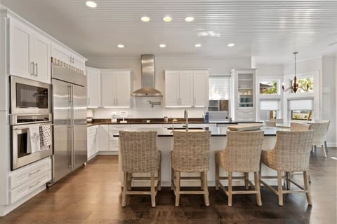We love this over sized kitchen island. The chef is never alone in this kitchen.