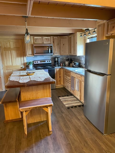 Large full size fridge for multiple family food storage.