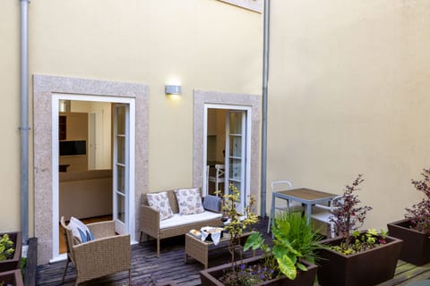 The charming private patio is located in the middle of the refurbished building.