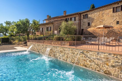 Seasonal outdoor pool, open 8:00 AM to 8:00 PM, pool umbrellas