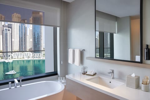 Deluxe Suite, Marina View | Bathroom | Bathrobes, slippers, towels