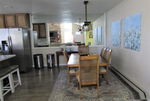 Dining room can accommodate six comfortably.