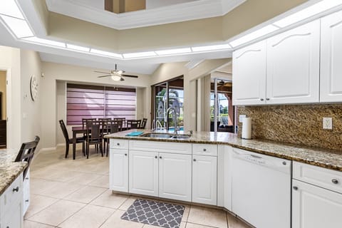 Kitchen Sink and bar area over looking the pool area