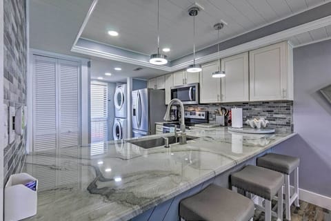 Grab a stool so you can snack & chat with the chef while dinner's being cooked!