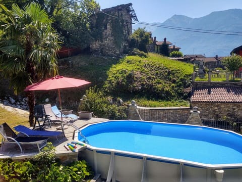 Water, Property, Sky, Plant, Swimming Pool, Nature, Blue, Azure, Building, Outdoor Furniture