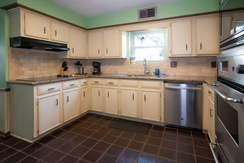 All the dishes, pots, pans, utensils you could ask for cooking and eating.