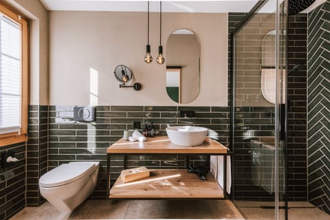 Signature Double Room | Bathroom | Designer toiletries, hair dryer, slippers, heated floors