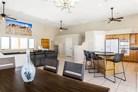 dining room looking into the kitchen with island seating for 4.
