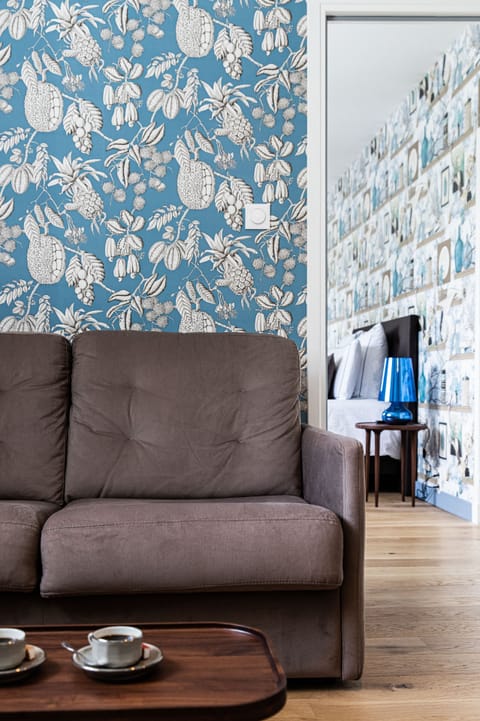 Deluxe Double Room | Living area | 40-inch Smart TV with digital channels, TV