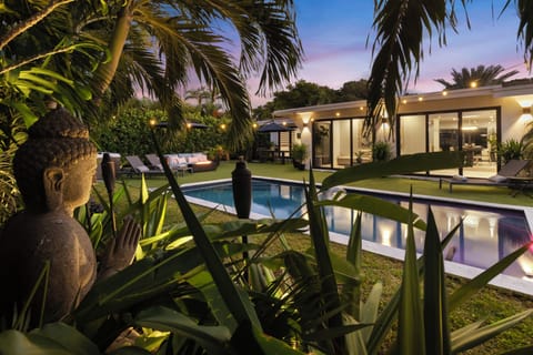 Lush landscaping surrounds this property making it very private