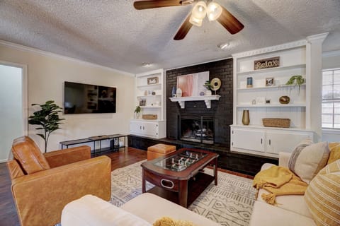 Smile and relax in the cozy living room.