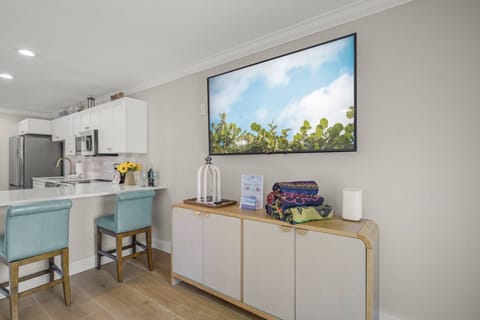 Cozy up on the sofa and enjoy a movie night on the wall-mounted TV