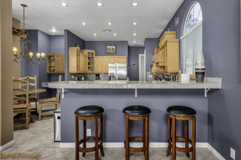 The kitchen is fully equipped and has lots of seating.