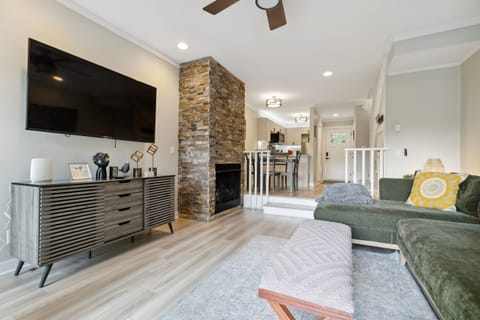 Enjoy the cozy living room with a gas fireplace and a Roku TV