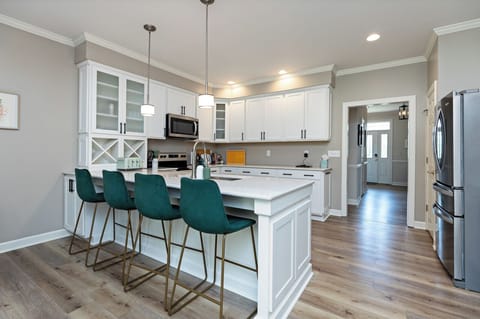 Island seating to chat while in the kitchen
