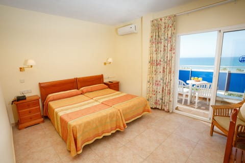 Double Room, Terrace, Sea View | In-room safe, blackout drapes, free WiFi, bed sheets