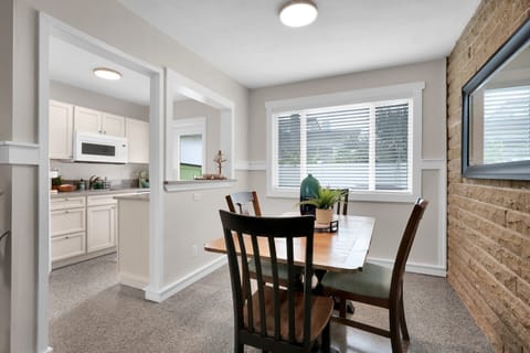 Time to eat with the fam! This dining room is prepped to seat 4!