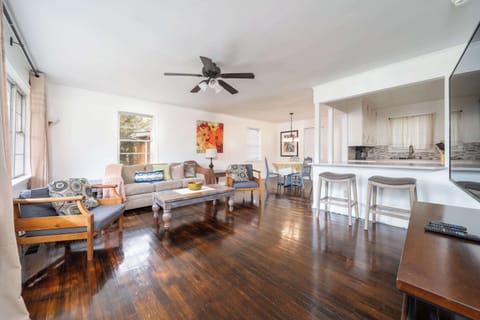 Spacious living room with large, smart TV and plenty of seating for the whole group!
