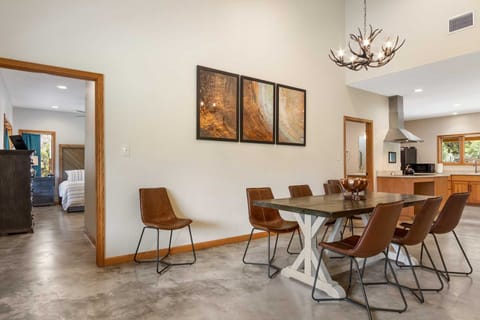 The ranch's dining room is situated conveniently close to the kitchen for family mealtime gatherings.