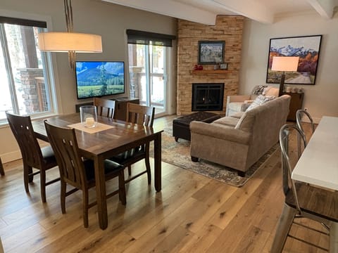 SIT BY THE GAS FIREPLACE AND ENJOY THE WOODED VIEW