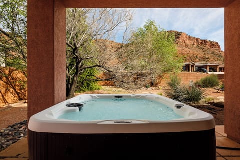 Brand new private hot tub on the back patio just outside the primary suite.