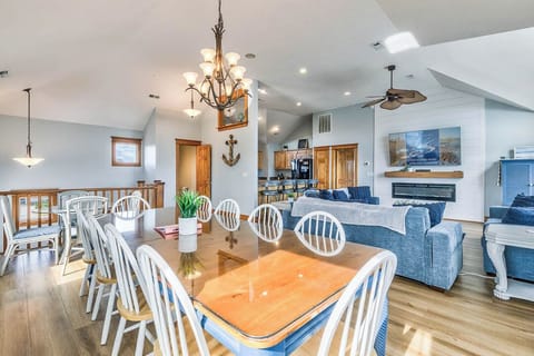 Top-Level Dining Room with Table (seats 10) and Additional Table (seats 4)