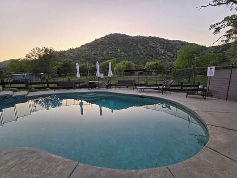 The pool, the mountain, the sunset — all waiting for you tonight.