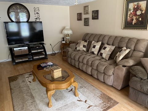 LIVING ROOM-COUCH, LOVE SEAT, 60 in TV w/ live streaming n RECLINERS