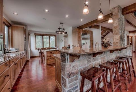 Additional bar seating is perfect for spending time together in the kitchen.