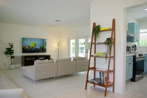 Living room with sectional sofa and abundant natural light